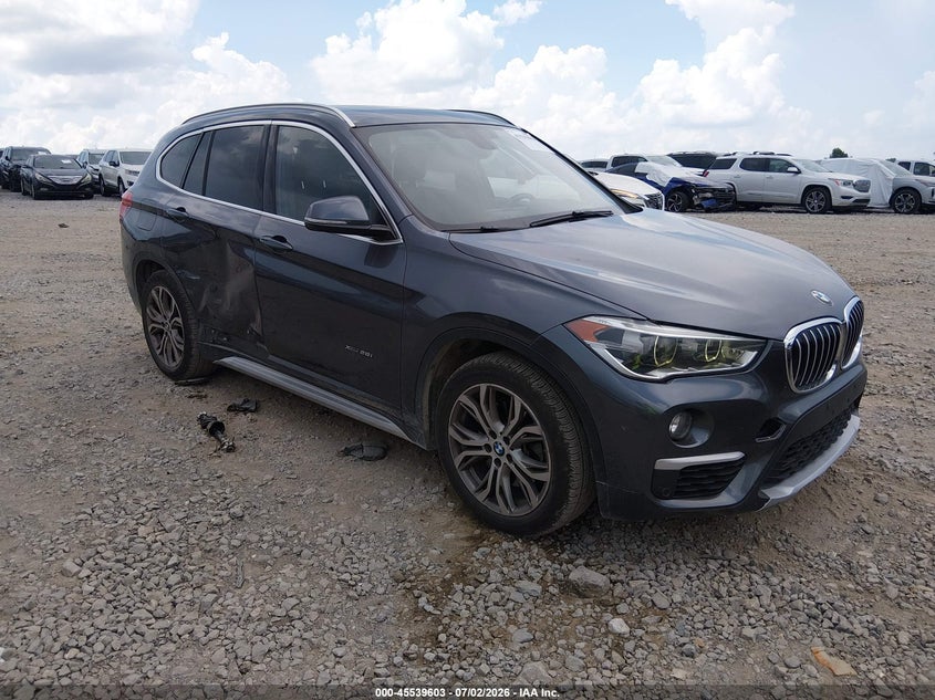 2017 BMW X1 VIN WBXHT3Z35H4A52212 IAAI salvage auction — SIDE, Salvage Title, sold $2,700 on 2026-07-17 (photo 1)