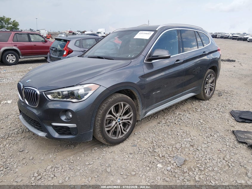 2017 BMW X1 VIN WBXHT3Z35H4A52212 IAAI salvage auction — SIDE, Salvage Title, sold $2,700 on 2026-07-17 (photo 2)