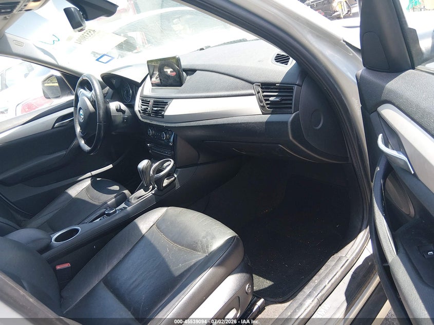 2015 BMW X1 VIN WBAVM5C54FVV94499 IAAI salvage auction — NORMAL WEAR, Original (Texas), sold $1,750 on 2026-08-01 (photo 5)