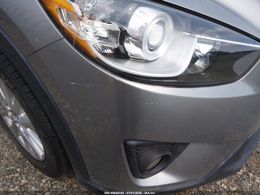 2014 Mazda Cx-5 VIN JM3KE2CY4E0335610 IAAI salvage auction — RIGHT FRONT, Clear (Texas), sold $2,250 on 2026-07-30 (photo 6)