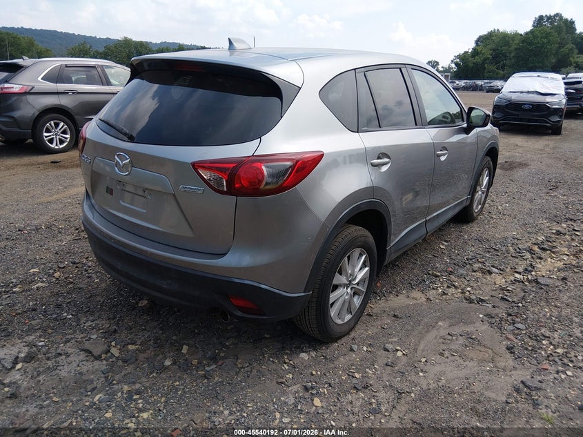 2014 Mazda Cx-5 VIN JM3KE2CY4E0335610 IAAI salvage auction — RIGHT FRONT, Clear (Texas), sold $2,250 on 2026-07-30 (photo 4)