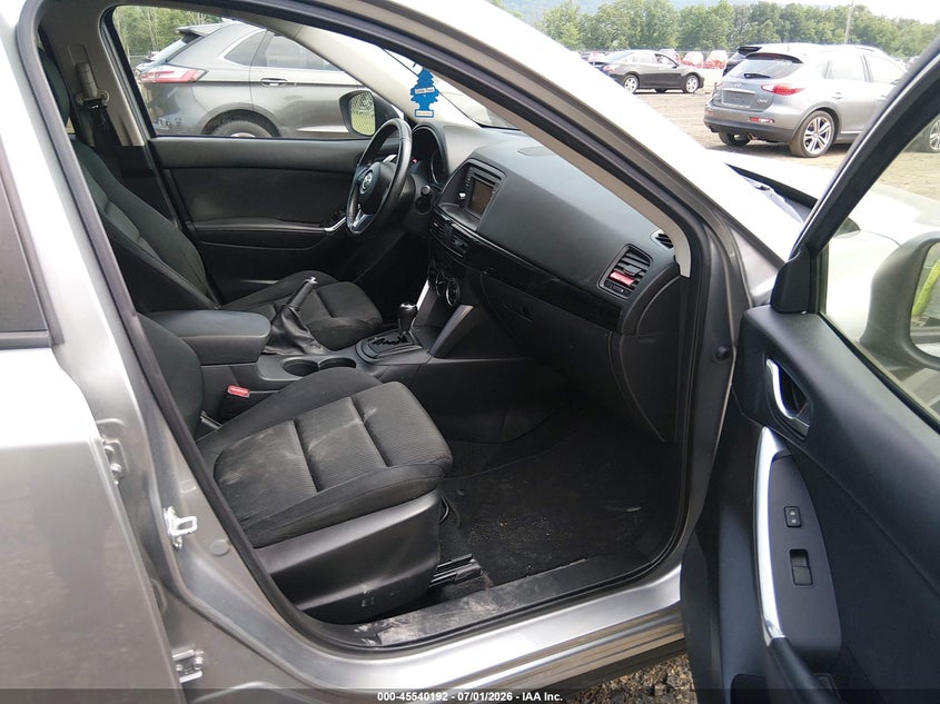 2014 Mazda Cx-5 VIN JM3KE2CY4E0335610 IAAI salvage auction — RIGHT FRONT, Clear (Texas), sold $2,250 on 2026-07-30 (photo 5)