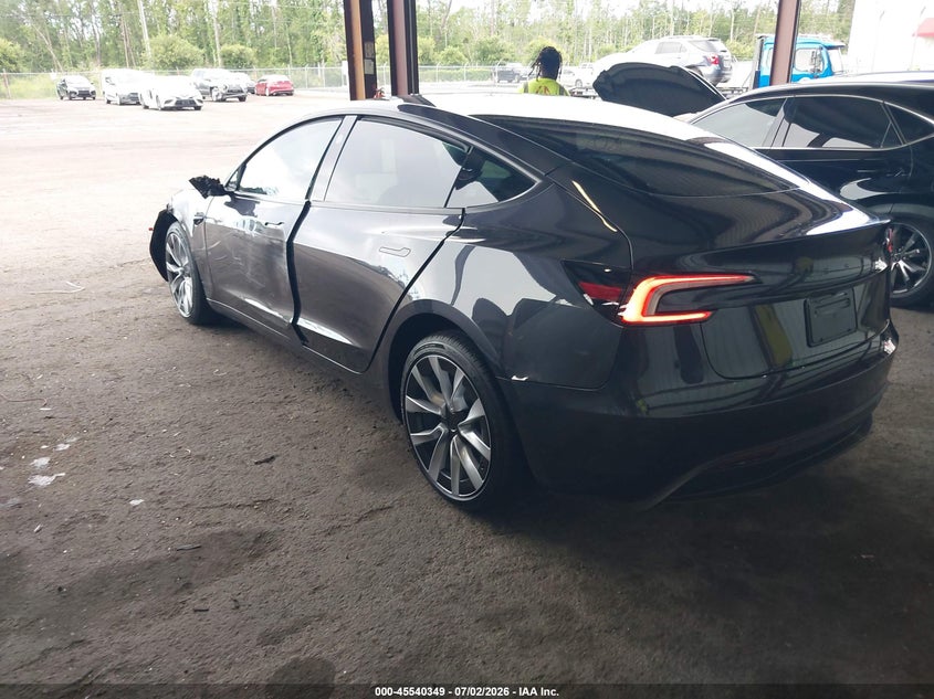 2026 Tesla Model 3 VIN 5YJ3E1EA0TF144286 IAAI salvage auction — SIDE, Rebuildable (Florida), sold $9,100 on 2026-07-30 (photo 3)