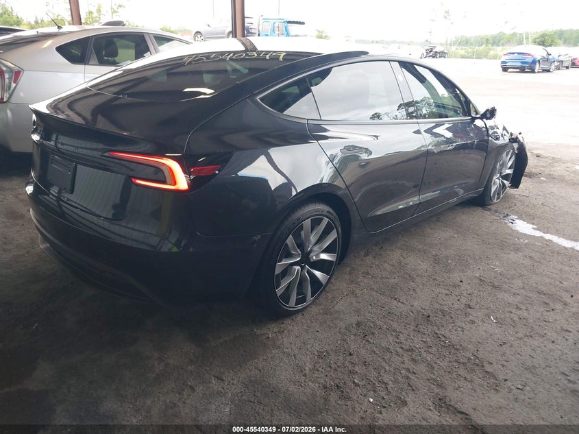 2026 Tesla Model 3 VIN 5YJ3E1EA0TF144286 IAAI salvage auction — SIDE, Rebuildable (Florida), sold $9,100 on 2026-07-30 (photo 4)