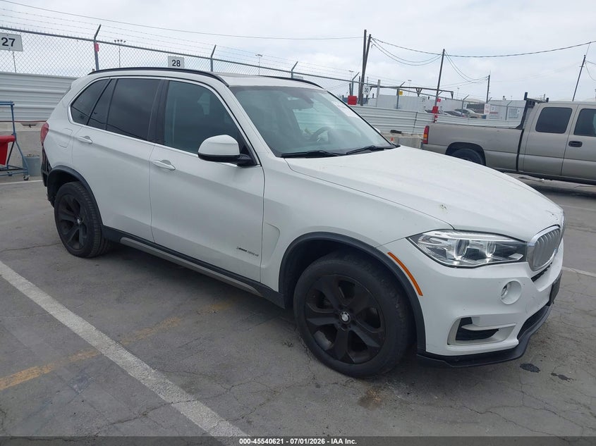 2015 BMW X5 VIN 5UXKS4C57F0N10998 IAAI salvage auction — REAR END, Salvage Title, sold $7,500 on 2026-07-29 (photo 1)