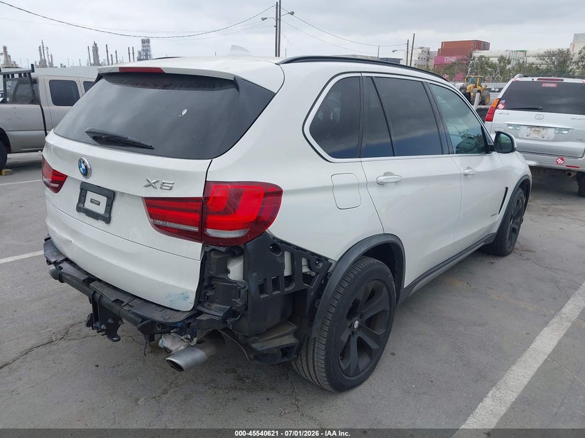 2015 BMW X5 VIN 5UXKS4C57F0N10998 IAAI salvage auction — REAR END, Salvage Title, sold $7,500 on 2026-07-23 (photo 4)