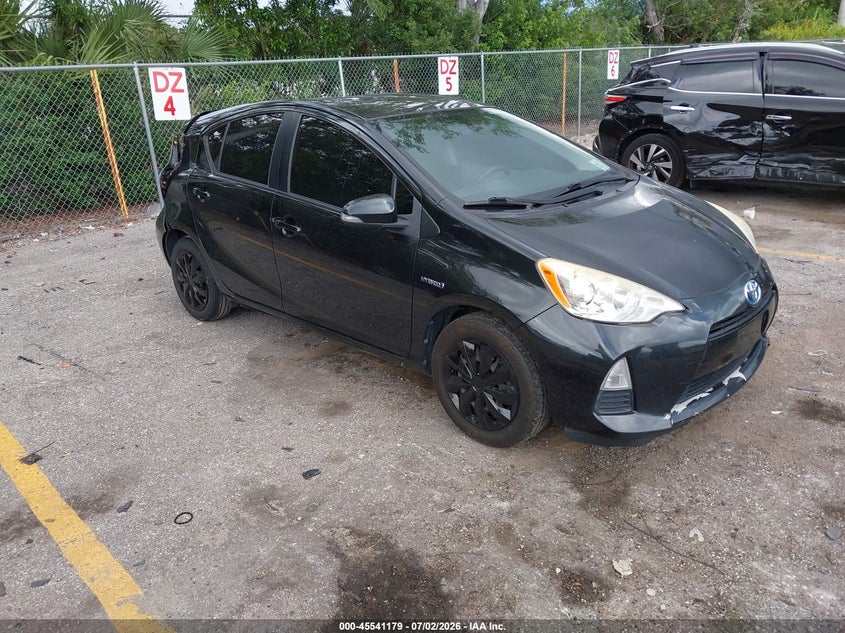 2014 Toyota Prius c VIN JTDKDTB3XE1084139 IAAI salvage auction — REAR END, Rebuildable (Florida), sold $1,075 on 2026-07-29 (photo 1)