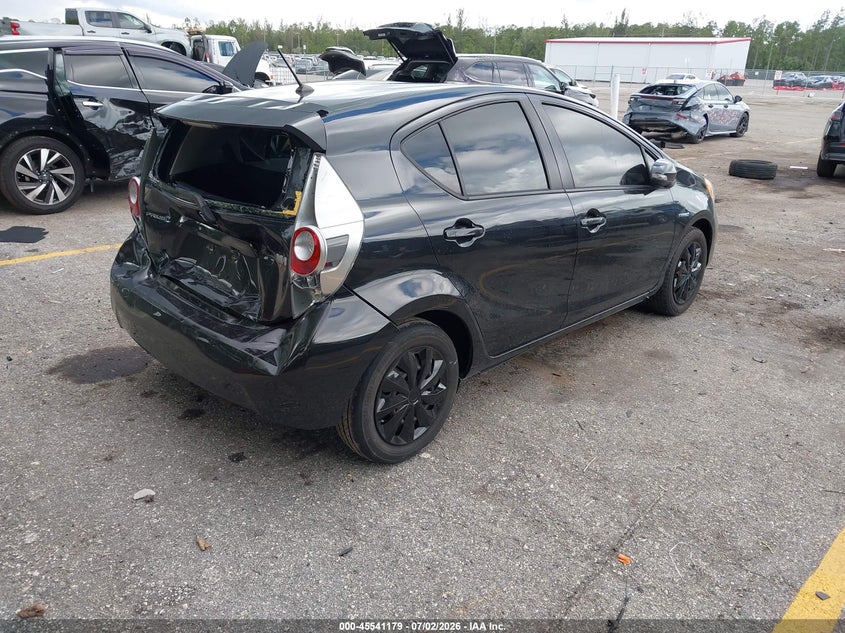 2014 Toyota Prius c VIN JTDKDTB3XE1084139 IAAI salvage auction — REAR END, Rebuildable (Florida), sold $1,075 on 2026-07-29 (photo 4)
