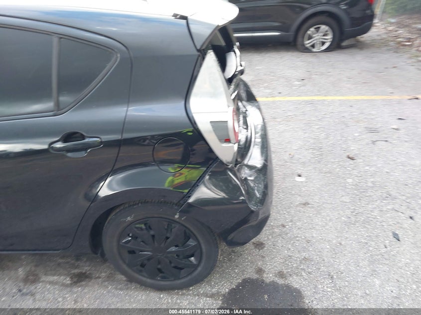 2014 Toyota Prius c VIN JTDKDTB3XE1084139 IAAI salvage auction — REAR END, Rebuildable (Florida), sold $1,075 on 2026-07-29 (photo 6)