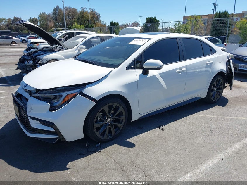 2023 Toyota Corolla VIN JTDBCMFE0PJ015001 IAAI salvage auction — FRONT & REAR, Salvage Title, sold $8,400 on 2026-07-23 (photo 2)