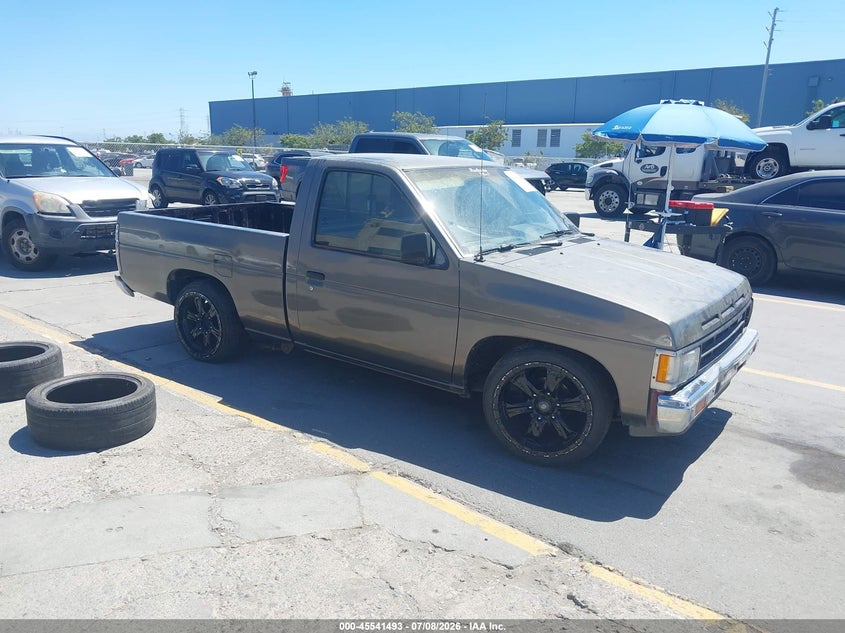 1989 Nissan D21 VIN 1N6ND11S2KC374110 IAAI salvage auction — LEFT REAR, Salvage (California), sold $375 on 2026-08-03 (photo 1)