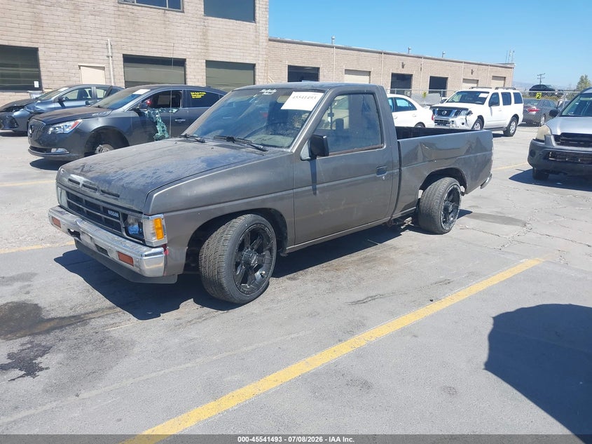 1989 Nissan D21 VIN 1N6ND11S2KC374110 IAAI salvage auction — LEFT REAR, Salvage (California), sold $375 on 2026-08-03 (photo 2)