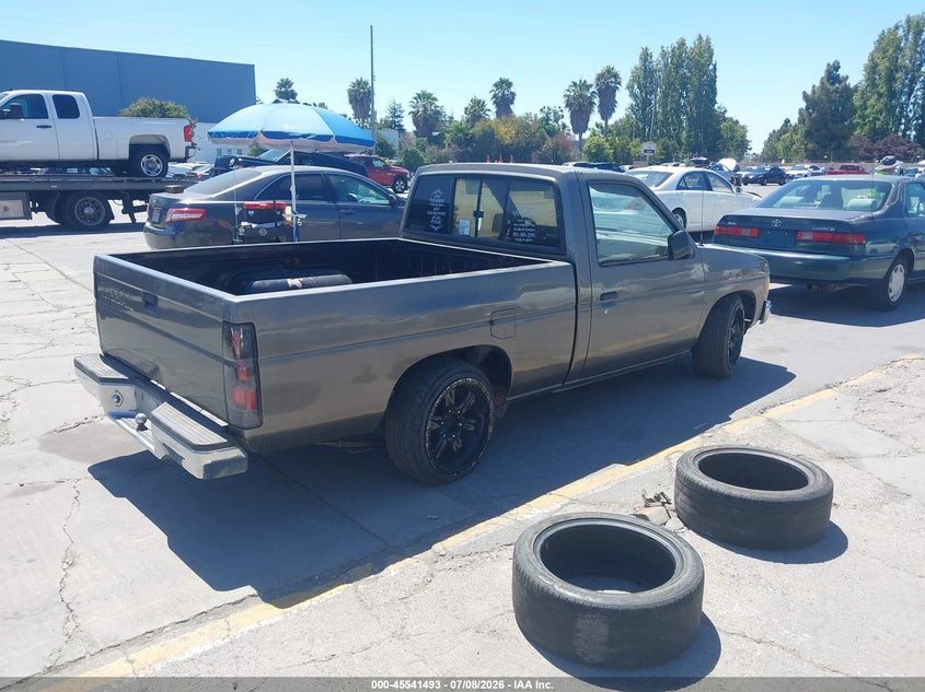 1989 Nissan D21 VIN 1N6ND11S2KC374110 IAAI salvage auction — LEFT REAR, Salvage (California), sold $375 on 2026-08-03 (photo 4)