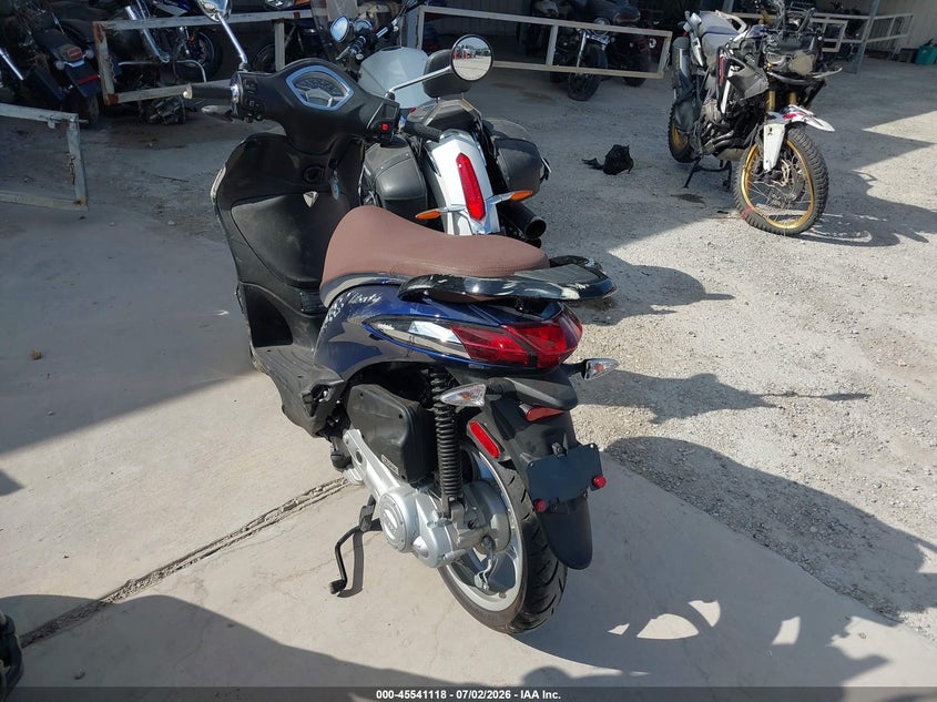 2023 Piaggio VIN ZAPC546B4P7002901 IAAI salvage auction — FRONT & REAR, Salvage (Texas), sold $325 on 2026-07-28 (photo 3)