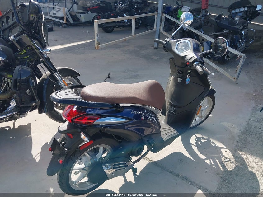 2023 Piaggio VIN ZAPC546B4P7002901 IAAI salvage auction — FRONT & REAR, Salvage (Texas), sold $325 on 2026-07-28 (photo 4)