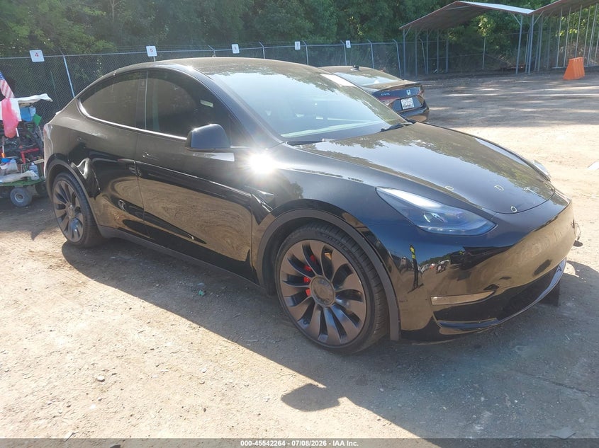 2023 Tesla Model y VIN 7SAYGDEF1PF698720 IAAI salvage auction — SIDE, Salvage Title, sold $8,400 on 2026-08-02 (photo 1)