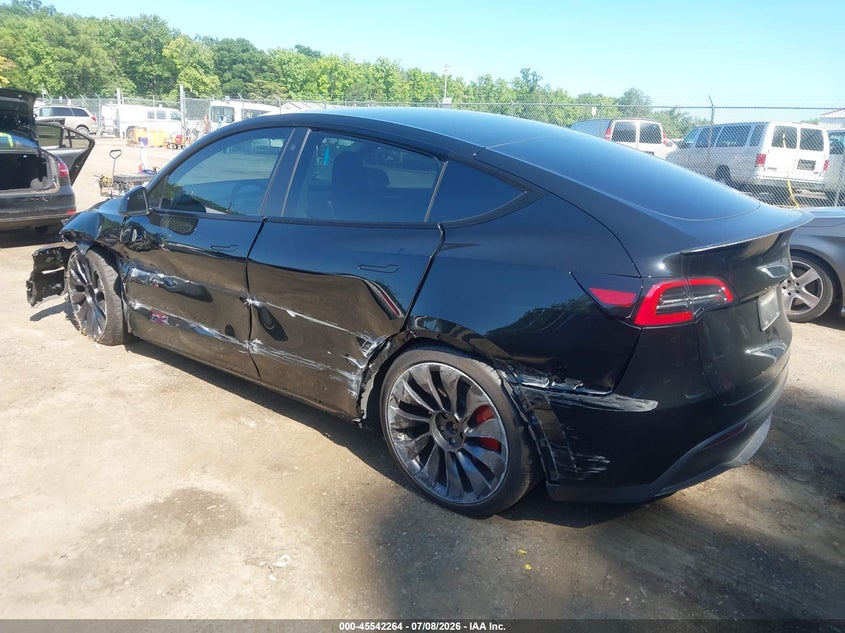 2023 Tesla Model y VIN 7SAYGDEF1PF698720 IAAI salvage auction — SIDE, Salvage Title, sold $8,400 on 2026-08-02 (photo 3)