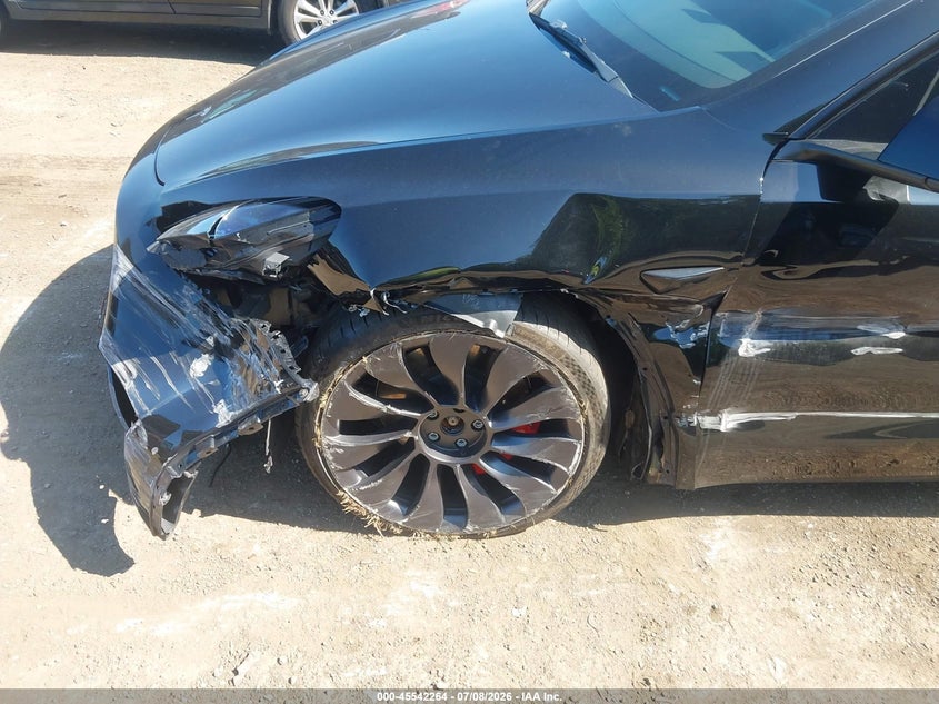 2023 Tesla Model y VIN 7SAYGDEF1PF698720 IAAI salvage auction — SIDE, Salvage Title, sold $8,400 on 2026-08-02 (photo 6)
