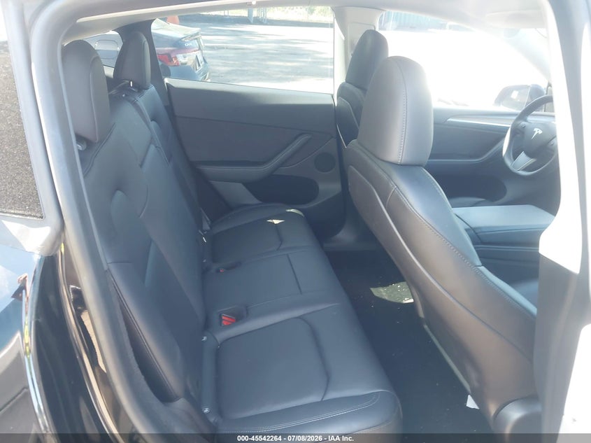 2023 Tesla Model y VIN 7SAYGDEF1PF698720 IAAI salvage auction — SIDE, Salvage Title, sold $8,400 on 2026-08-02 (photo 8)