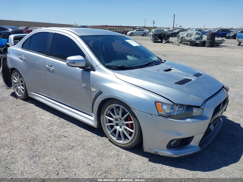 2015 Mitsubishi Lancer evolution VIN JA32W8FV8FU006606 IAAI salvage auction — FRONT & REAR, Salvage Title, sold $6,900 on 2026-07-30 (photo 1)
