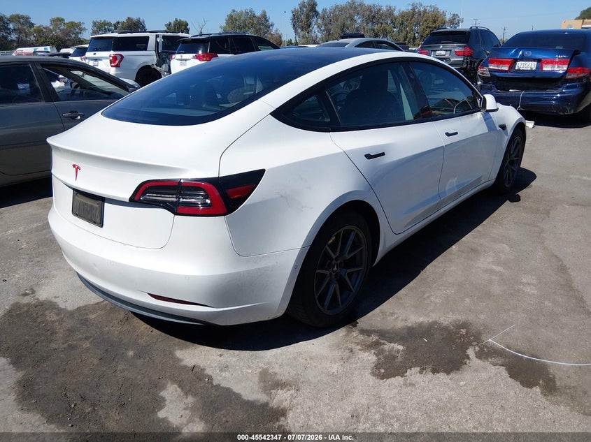 2021 Tesla Model 3 VIN 5YJ3E1EB8MF066821 IAAI salvage auction — LEFT SIDE, Salvage (California), sold $5,500 on 2026-07-31 (photo 4)