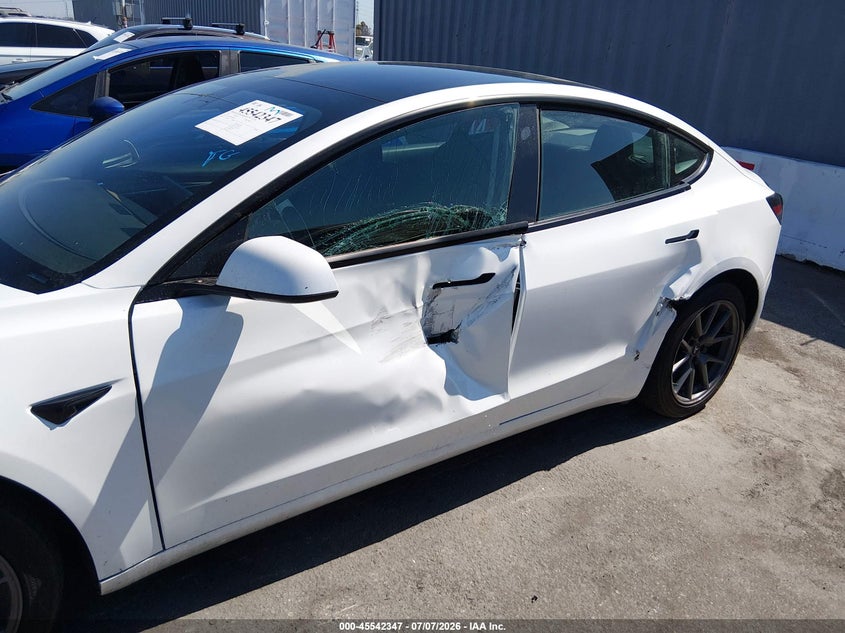 2021 Tesla Model 3 VIN 5YJ3E1EB8MF066821 IAAI salvage auction — LEFT SIDE, Salvage (California), sold $5,500 on 2026-07-31 (photo 6)