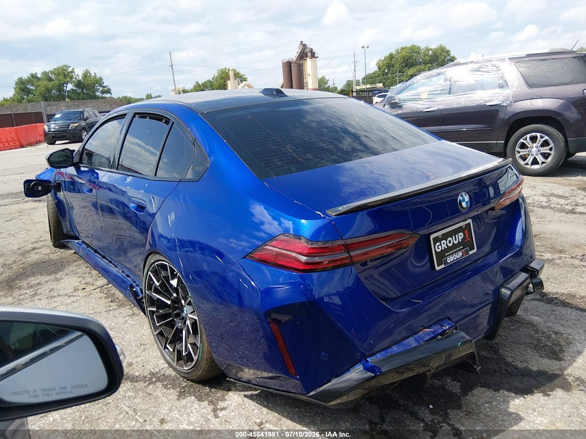 2025 BMW M5 VIN WBS83FK06SCT09928 IAAI salvage auction — LEFT FRONT, Salvage (Kansas), sold $49,300 on 2026-08-03 (photo 3)