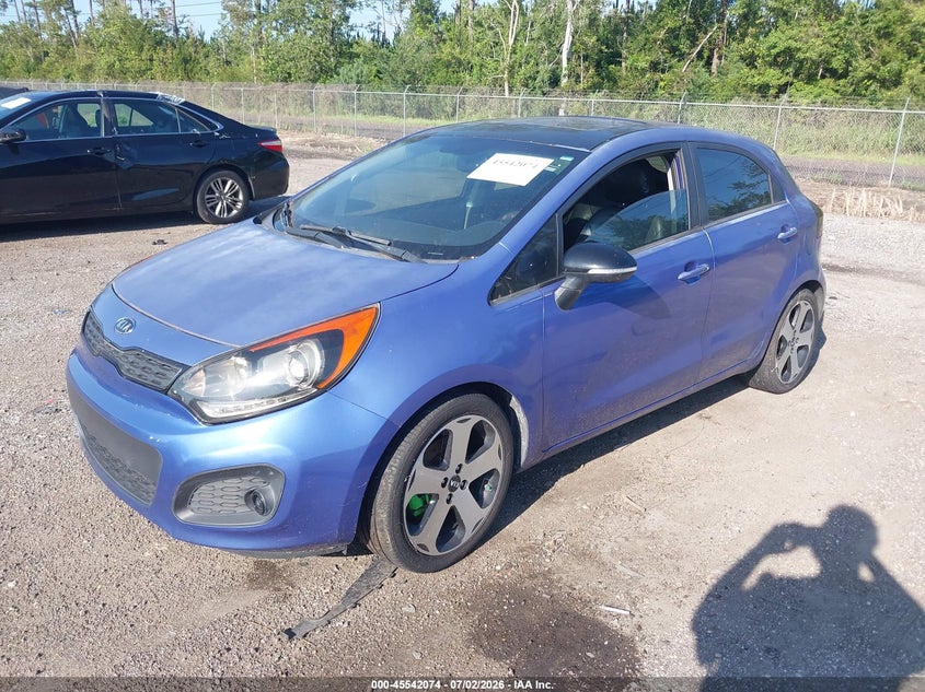 2012 Kia Rio VIN KNADN5A36C6030398 IAAI salvage auction — UNKNOWN, Clear (Florida), sold $300 on 2026-07-21 (photo 2)