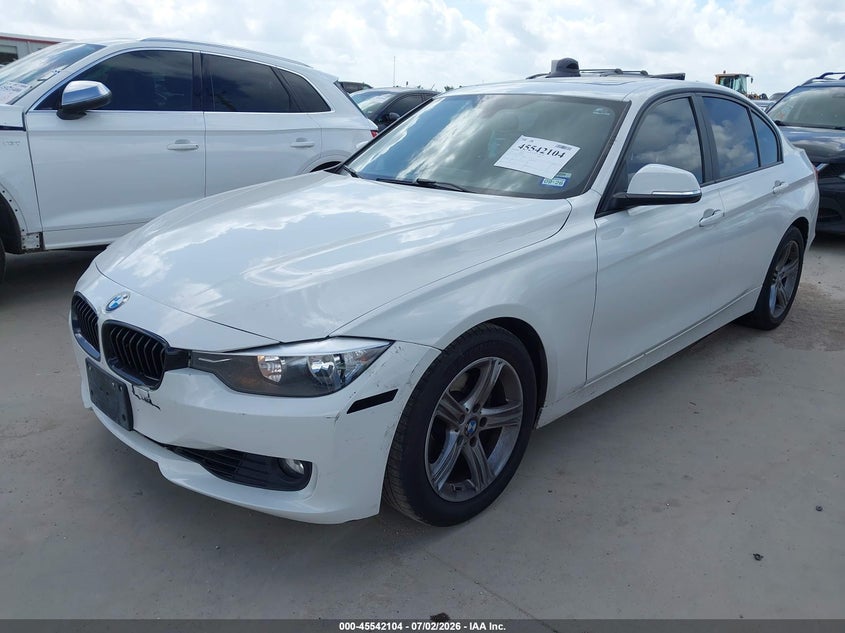 2015 BMW 3er VIN WBA3A5C51FP605415 IAAI salvage auction — NORMAL WEAR, Original (Texas), sold $600 on 2026-07-28 (photo 2)