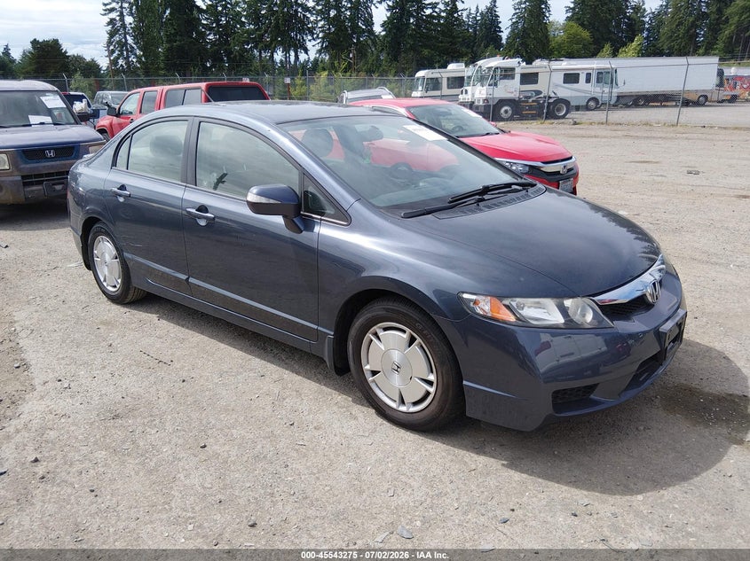 2010 Honda Civic hybrid VIN JHMFA3F20AS002370 IAAI salvage auction — NORMAL WEAR, Clear (Washington), sold $1,050 on 2026-07-09 (photo 1)