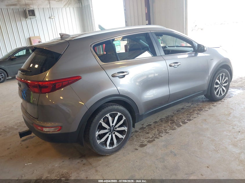 2017 Kia Sportage VIN KNDPNCAC3H7220598 IAAI salvage auction — NORMAL WEAR, Clear (Michigan), sold $2,100 on 2026-07-21 (photo 4)