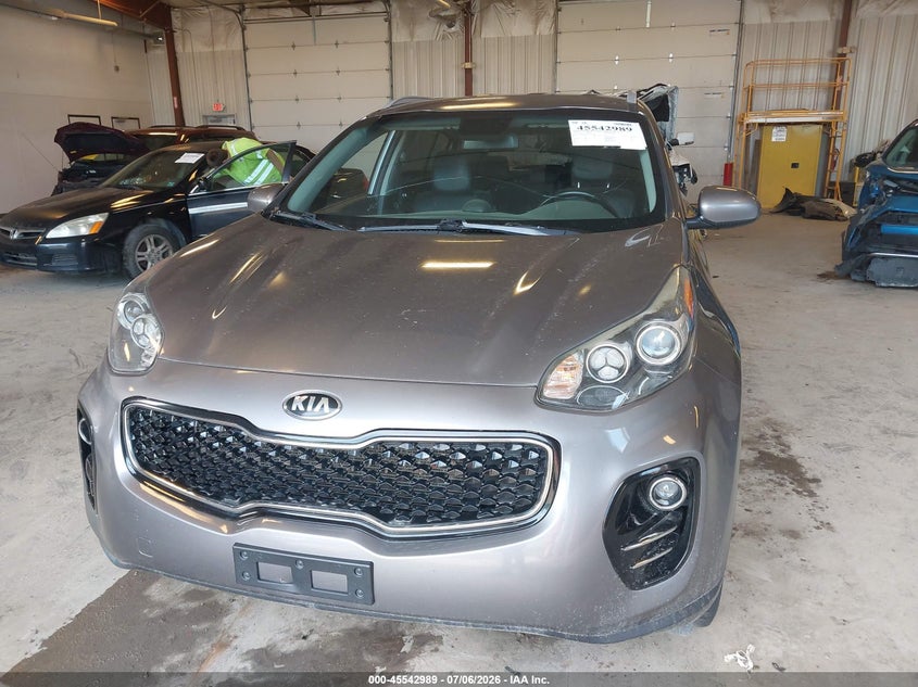 2017 Kia Sportage VIN KNDPNCAC3H7220598 IAAI salvage auction — NORMAL WEAR, Clear (Michigan), sold $2,100 on 2026-07-21 (photo 6)