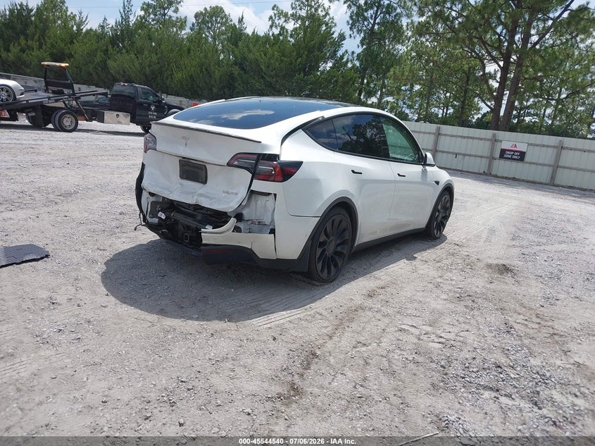 2022 Tesla Model y VIN 7SAYGDEF9NF414666 IAAI salvage auction — REAR END, Salvage Title, sold $6,800 on 2026-07-26 (photo 4)