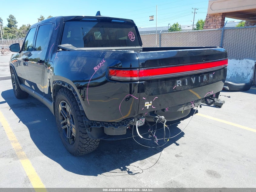 2023 Rivian R1t VIN 7FCTGAAAXPN020981 IAAI salvage auction — REAR END, Salvage Title, sold $15,600 on 2026-07-20 (photo 6)