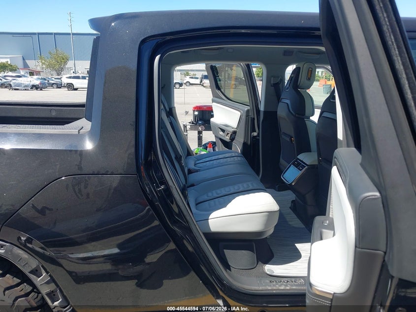 2023 Rivian R1t VIN 7FCTGAAAXPN020981 IAAI salvage auction — REAR END, Salvage Title, sold $15,600 on 2026-07-20 (photo 8)