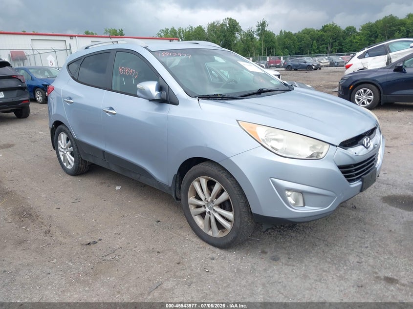2010 Hyundai Tucson VIN KM8JUCAC8AU054008 IAAI salvage auction — SIDE, Mv-907A (New York), sold $1,300 on 2026-07-17 (photo 1)