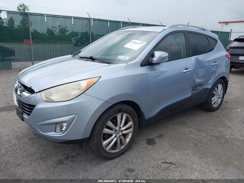 2010 Hyundai Tucson VIN KM8JUCAC8AU054008 IAAI salvage auction — SIDE, Mv-907A (New York), sold $1,300 on 2026-07-17 (photo 2)