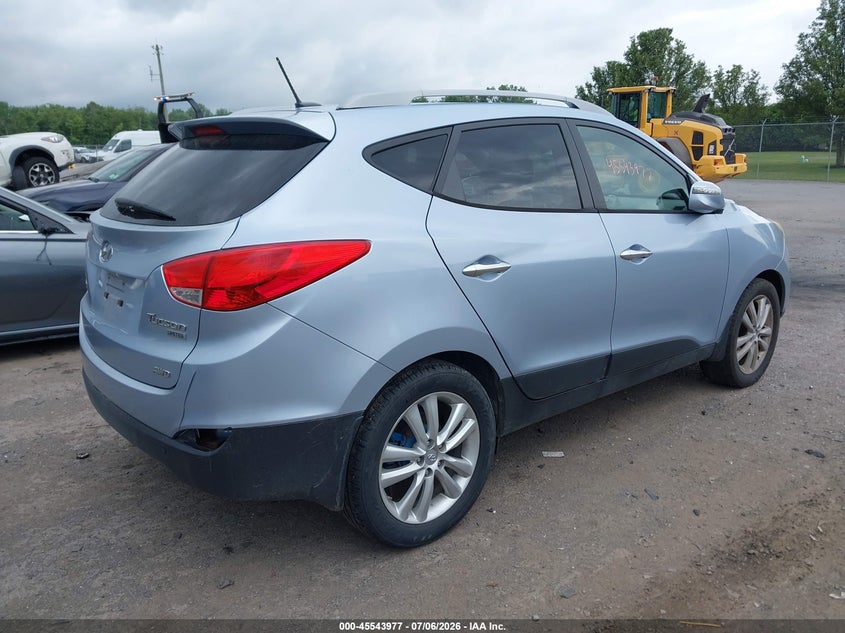 2010 Hyundai Tucson VIN KM8JUCAC8AU054008 IAAI salvage auction — SIDE, Mv-907A (New York), sold $1,300 on 2026-07-17 (photo 4)