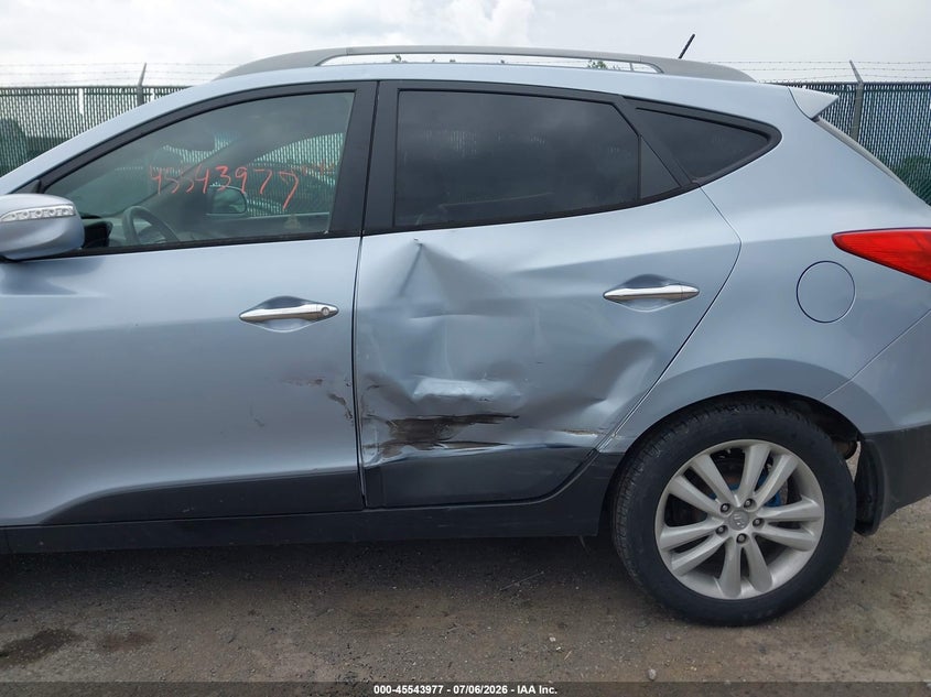2010 Hyundai Tucson VIN KM8JUCAC8AU054008 IAAI salvage auction — SIDE, Mv-907A (New York), sold $1,300 on 2026-07-17 (photo 6)