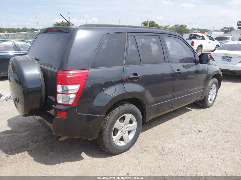 2006 Suzuki Grand vitara VIN JS3TD944X64103397 IAAI salvage auction — NORMAL WEAR, Clear (Kansas), sold $1,550 on 2026-07-10 (photo 4)