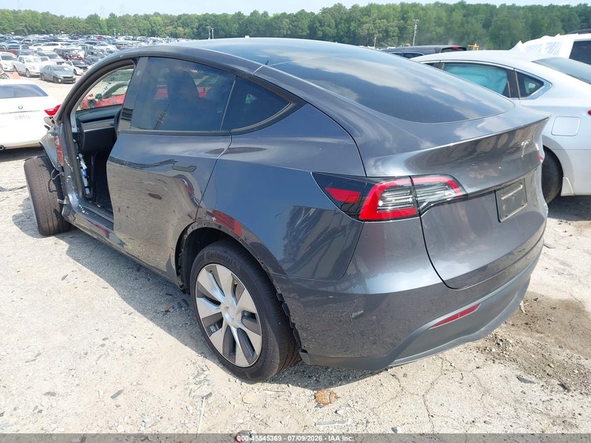 2023 Tesla Model y VIN 7SAYGDEE4PF616244 IAAI salvage auction — SIDE, Salvage Title, sold $11,500 on 2026-08-19 (photo 3)
