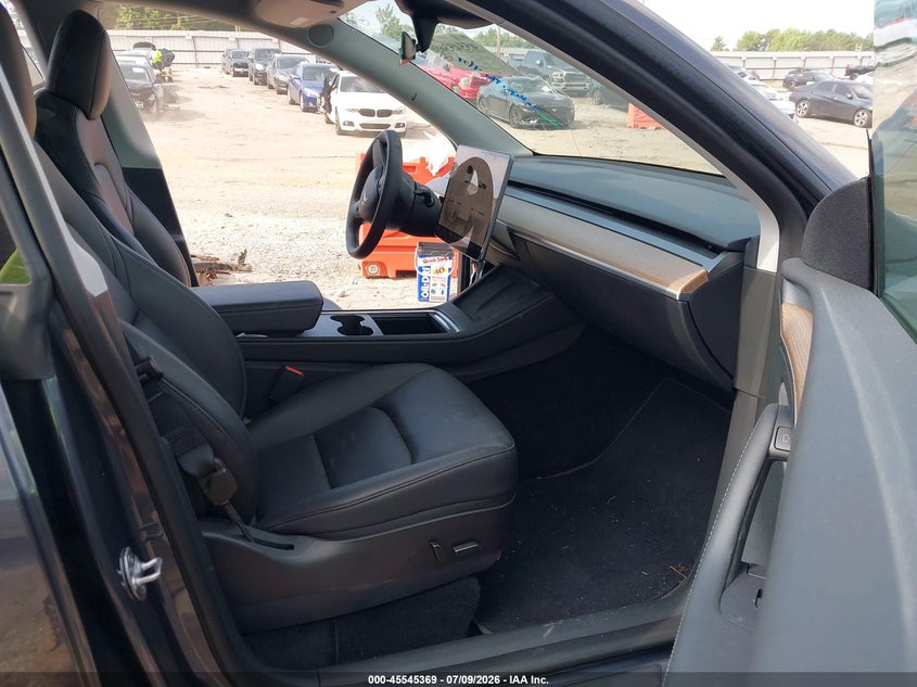 2023 Tesla Model y VIN 7SAYGDEE4PF616244 IAAI salvage auction — SIDE, Salvage Title, sold $11,500 on 2026-08-19 (photo 5)
