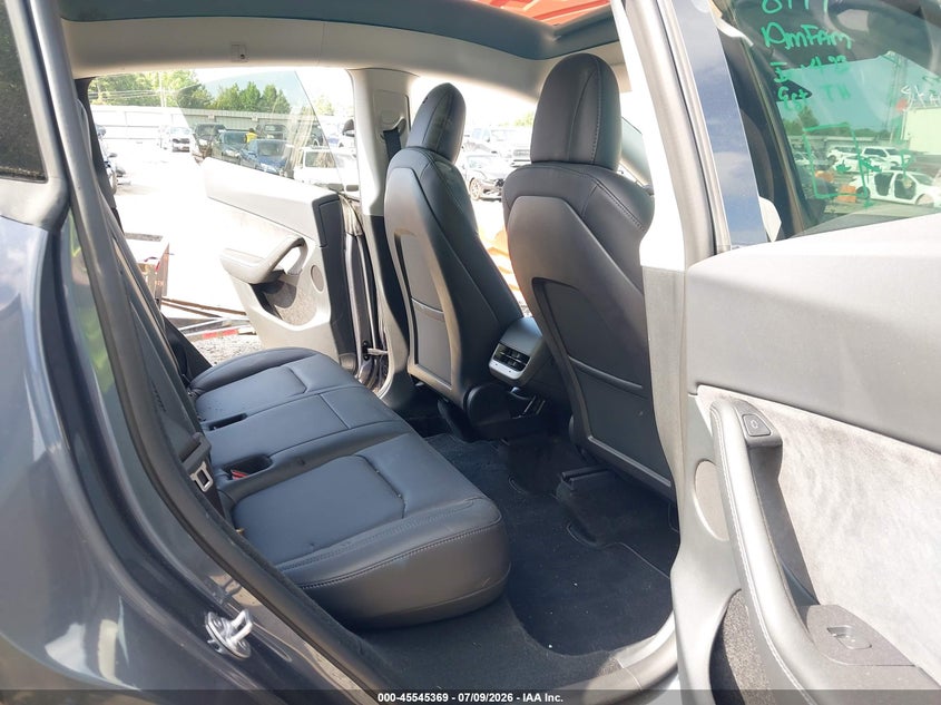 2023 Tesla Model y VIN 7SAYGDEE4PF616244 IAAI salvage auction — SIDE, Salvage Title, sold $11,500 on 2026-08-19 (photo 8)