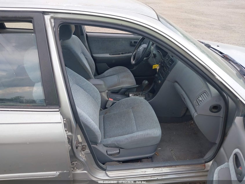 2003 Kia Optima VIN KNAGD126935202463 IAAI salvage auction — NORMAL WEAR, Clear (Alabama), sold $325 on 2026-07-08 (photo 5)