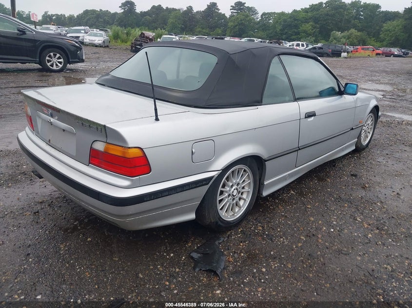 1998 BMW 3 series VIN WBABJ8323WEM22211 IAAI salvage auction — NORMAL WEAR, Clear (New York), sold $1,150 on 2026-07-14 (photo 4)
