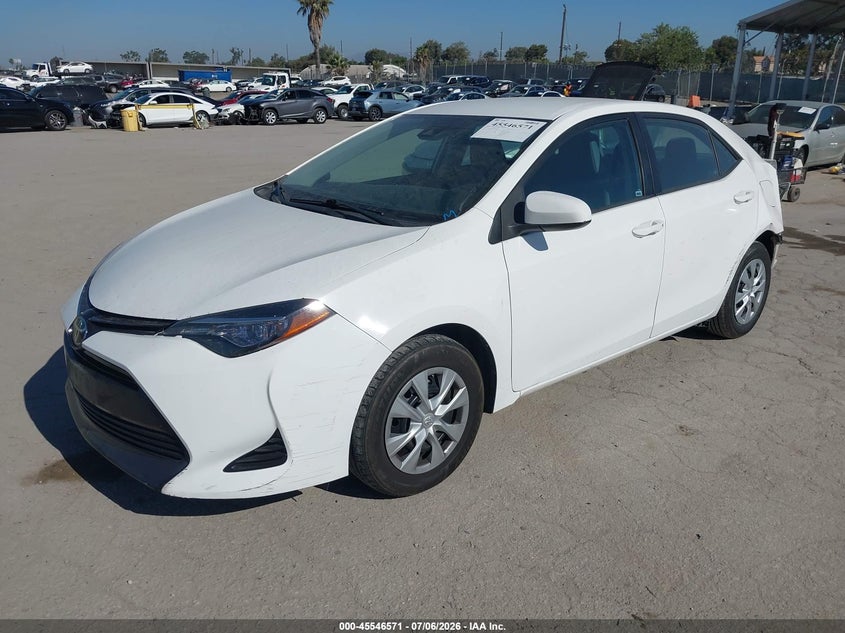 2017 Toyota Corolla VIN 5YFBURHEXHP732431 IAAI salvage auction — LEFT REAR, Salvage (California), sold $50 on 2026-07-29 (photo 2)