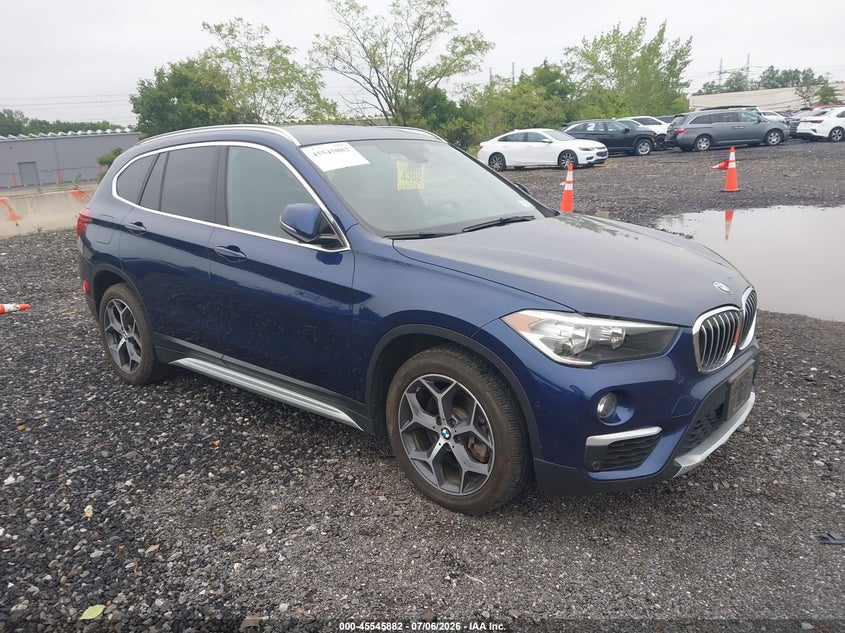 2018 BMW X1 VIN WBXHT3C37J5L33725 — IAAI salvage auction photo