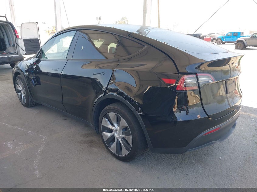 2023 Tesla Model y VIN 7SAYGDEEXPF883291 IAAI salvage auction — LEFT SIDE, Salvage Title, sold $9,000 on 2026-07-29 (photo 3)