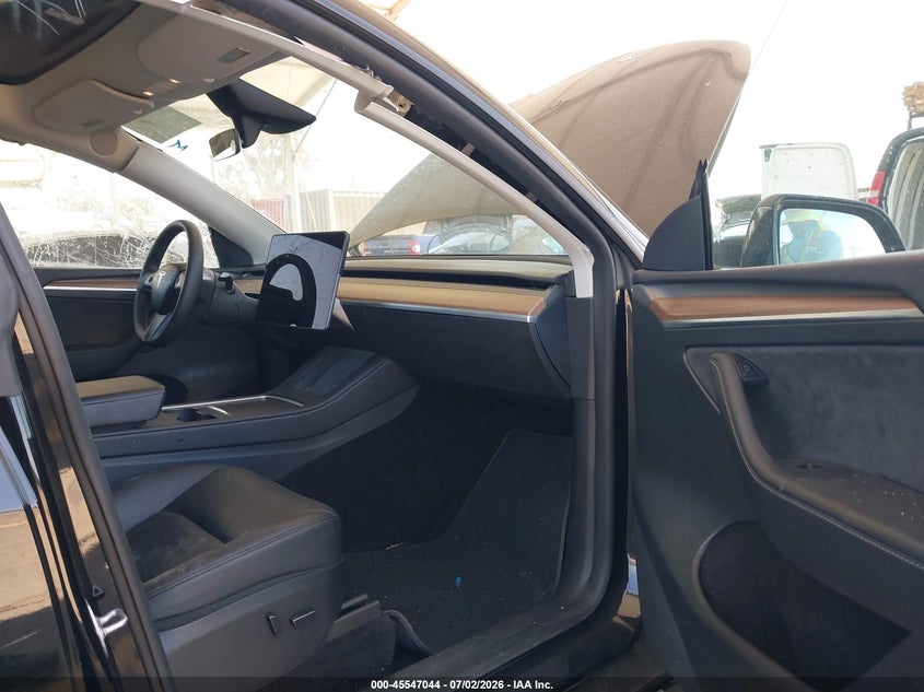 2023 Tesla Model y VIN 7SAYGDEEXPF883291 IAAI salvage auction — LEFT SIDE, Salvage Title, sold $9,000 on 2026-07-29 (photo 5)