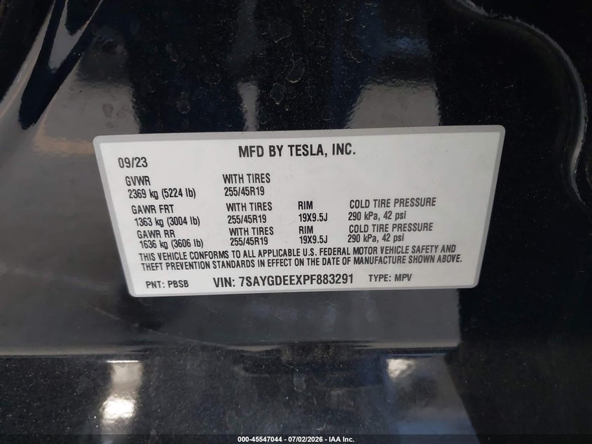 2023 Tesla Model y VIN 7SAYGDEEXPF883291 IAAI salvage auction — LEFT SIDE, Salvage Title, sold $9,000 on 2026-07-29 (photo 9)